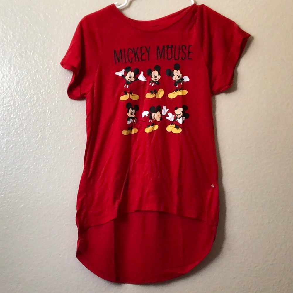 Red Mickey Mouse shirt.